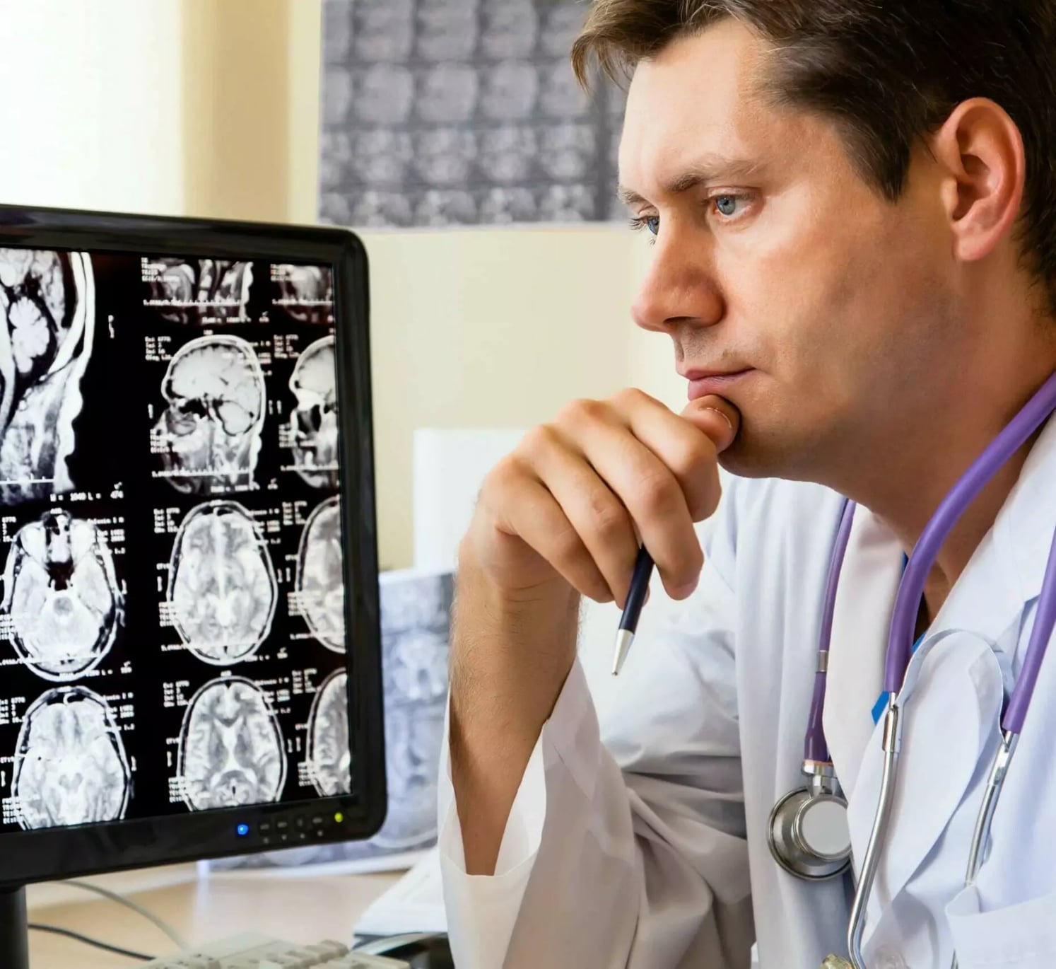 Doctor examining radiology scans